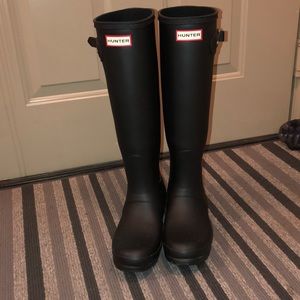 Black tall Hunter boots